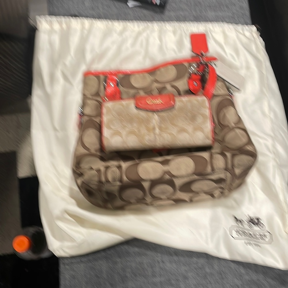 Coach purse and wallet combination. Wallet has been used and some wear and tear.